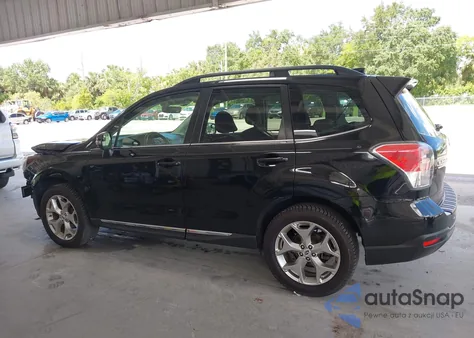 2018 Subaru Forester 2.5I Touring z USA, uszkodzony, nr VIN JF2SJAWC2JH574536